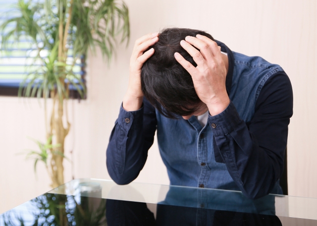 遅刻してしまった男性